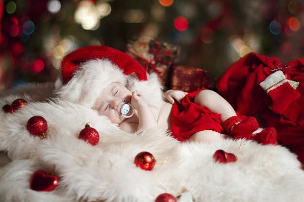 Fotografías de bebés que disfrutan a lo grande en Navidad 5